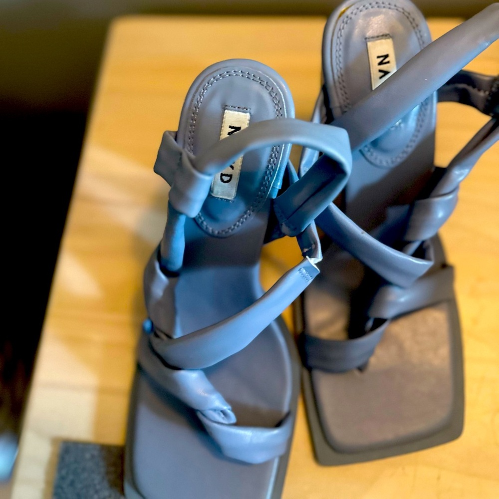 Sandal heel shoes.